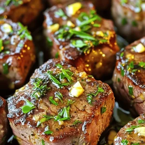 - 1 lb sirloin steak, cut into 1-inch cubes - 4 tablespoons unsalted butter - 4 cloves garlic, minced For the best flavor, I always choose sirloin steak. It&rsquo;s tender and easy to work with. Unsalted butter adds richness, while fresh garlic gives a strong, aromatic kick. - 1 teaspoon fresh rosemary, chopped - 1 teaspoon fresh thyme, chopped - Salt and pepper to taste - 2 tablespoons olive oil Fresh herbs like rosemary and thyme brighten the dish. Salt and pepper bring out the steak&rsquo;s natural taste. Olive oil helps cook the meat evenly and adds a light flavor. - Fresh parsley - Serving suggestions (e.g., with sides) I like to add fresh parsley for color and freshness. These steak bites pair well with sides like mashed potatoes or a crisp salad. For the full recipe, check [Full Recipe]. Start by seasoning the steak cubes with salt and pepper. Use enough to coat each piece well. This step adds flavor right from the start. Let the seasoned steak rest for about 15 minutes. This allows the meat to come to room temperature. Room temperature steak cooks more evenly. It also helps achieve a nice crust when searing. Heat a large skillet over medium-high heat. Add olive oil once the skillet is hot. Place the steak cubes in a single layer. Avoid crowding the pan to ensure even cooking. Sear each side for 2-3 minutes. This timing gives a nice browning. For medium-rare, aim for an internal temperature of 130&deg;F (54&deg;C). Once done, remove the steak from the skillet and set it aside. In the same skillet, lower the heat to medium. Add the unsalted butter and minced garlic. Be careful with the heat; burnt garlic tastes bitter. Stir the mixture for 1-2 minutes. You want the garlic fragrant but not brown. Next, add chopped rosemary and thyme. These herbs bring out a rich flavor. Combine everything well, then return the steak bites to the skillet. Toss them in the garlic butter until well coated. Cook for another minute to warm the steak through. For the full recipe, check out the detailed instructions above. - Choosing the right cut of meat: Sirloin works great for steak bites. It is tender and has good flavor. You can also try ribeye or filet mignon for a richer taste. Always pick fresh meat for the best outcome. - Importance of an accurate thermometer: Use a meat thermometer to check doneness. For medium-rare, aim for 130&deg;F (54&deg;C). This helps you avoid overcooking the meat, keeping it juicy and tender. - Experimenting with spices and herbs: Don&rsquo;t be afraid to play with flavors. Add chili flakes for heat or smoked paprika for depth. Fresh herbs like parsley or basil can also brighten the dish. - Using additional sauces for flavor depth: A drizzle of balsamic glaze or a spoonful of Dijon mustard can add a nice kick. You can mix these sauces into the garlic butter for a unique twist. - Plating suggestions for aesthetics: Use a clean white plate to showcase the steak bites. Arrange them in a circle or stack them for height. Drizzle some garlic butter around the edges for a visual pop. - Pairing with complementary side dishes: Serve with roasted veggies or a fresh salad. These sides balance the richness of the steak and add color to your plate. For a fun twist, try serving with garlic bread for extra flavor! For the full recipe, check out the Garlic Butter Steak Bites. {{image_2}} You can enjoy garlic butter steak bites with many steak cuts. Ribeye is a great choice. It has a good amount of fat. This makes it tender and juicy. Filet mignon is another option. It is very tender and mild in flavor. Flank steak works well too. It has a strong beef taste and is great for marinating. You can use any of these cuts to make your dish unique and tasty. Want to spice things up? Try adding chili flakes for some heat. This will give your steak bites a nice kick. You can also mix in different herbs. Basil, oregano, or parsley can change the taste. Fresh herbs add brightness and flavor. Feel free to get creative and find your favorite mix! You can cook garlic butter steak bites in different ways. Grilling gives a great smoky flavor. Just make sure to keep the heat high. If you prefer, you can also use a skillet. It gives a nice sear and is easy to control. Baking in the oven is another method. Preheat your oven to 400&deg;F (204&deg;C). Place the seasoned steak bites on a baking sheet. Bake for about 10-12 minutes, or until they are cooked to your liking. This method is simple and requires less attention. Each method gives a different texture and flavor. Choose what works best for you! For the full recipe, check out the [Full Recipe]. To keep your garlic butter steak bites fresh, follow these tips: - Allow the steak bites to cool completely before storing. - Place them in an airtight container to prevent moisture loss. - Store in the fridge for up to 3 days. For longer storage, you can freeze the leftovers: - Wrap the steak bites tightly in plastic wrap. - Place them in a freezer-safe bag or container. - They can last up to 3 months in the freezer. When reheating your steak bites, you have two main options: stovetop or microwave. Stovetop: - Heat a skillet over medium-low heat. - Add a little olive oil or butter. - Place the steak bites in the skillet, turning them often. - This method keeps the steak tender and flavorful. Microwave: - Place steak bites in a microwave-safe dish. - Cover with a damp paper towel to retain moisture. - Heat in short bursts, stirring in between. - Be careful not to overcook them, or they may get tough. Your steak bites can last in the fridge for about 3 days. After that, they may spoil. Signs of spoilage include: - A sour smell or off odor. - Changes in color or texture. - Slimy or sticky surface. If you notice any of these signs, it's best to throw them away. Enjoy your garlic butter steak bites while they are fresh! For the full recipe, check the earlier section. For Garlic Butter Steak Bites, I recommend using sirloin steak. Sirloin is tender, flavorful, and affordable. It cooks quickly, making it perfect for this dish. You can also try ribeye or filet mignon for a richer taste. Ribeye has more marbling, which adds great flavor. Filet mignon is super tender and melts in your mouth. Each cut has its own charm, but sirloin is my go-to for easy cooking. Yes, you can prepare this recipe ahead of time. Cook the steak bites and store them in an airtight container. Keep them in the fridge for up to three days. When you're ready to eat, just reheat them in a skillet. Add a bit of butter and garlic to keep the flavors fresh. You can also cook the garlic butter sauce ahead. Just combine it with the steak bites right before serving for a warm, tasty dish. To check if your steak is perfectly cooked, use a meat thermometer. For medium-rare, look for an internal temperature of 130&deg;F (54&deg;C). If you don&rsquo;t have a thermometer, look for the following signs: - The steak should feel firm but slightly springy. - The juices should run clear, not pink. - If you cut into it, the inside should be a warm red-pink. These tips will help you nail the perfect steak every time. For more details, check the Full Recipe. Garlic Butter Steak Bites are simple and tasty. We covered key ingredients like sirloin, garlic, and butter. The step-by-step guide helps with cooking perfectly tender steak. Tips on enhancing flavor and presentation can elevate your dish. Don&rsquo;t forget about variations and storage options for leftovers. With these ideas, you can impress anyone at the table. Enjoy cooking and sharing this delicious meal with friends and family!