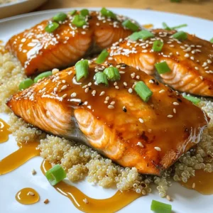 The right ingredients make this dish shine. Here&rsquo;s what you need to create the perfect honey garlic glazed salmon: - 4 salmon fillets - 1/4 cup honey - 1/4 cup low sodium soy sauce - 4 cloves garlic, minced - 1 tablespoon fresh ginger, grated - 2 tablespoons olive oil - 1 tablespoon sesame oil - 1 teaspoon red pepper flakes (optional) - 2 green onions, chopped - Sesame seeds for garnish These ingredients blend to create a sweet and savory glaze. Honey adds a natural sweetness. Soy sauce brings umami flavor. Garlic and ginger give it a fresh kick. You can adjust the red pepper flakes to make it spicy or keep it mild. Gather these ingredients before you start cooking. Each one plays a key role in making your salmon delicious. You can find the full recipe to get all the details on how to prepare this dish. To start, gather your ingredients. In a bowl, mix honey, soy sauce, minced garlic, grated ginger, olive oil, sesame oil, and red pepper flakes if you want some heat. This mix brings out the best flavors in salmon. Place the salmon fillets in a resealable bag or a shallow dish. Pour the marinade over the salmon, making sure each piece gets coated well. Seal the bag or cover the dish. Let it sit in the fridge for at least 30 minutes. You can go up to 2 hours for extra flavor. Next, preheat your oven to 400&deg;F (200&deg;C). This step is key for even cooking. While it warms up, prepare a baking sheet. Line it with parchment paper to prevent sticking. This makes cleanup a breeze. Now it's time to bake. Take the salmon out of the marinade but save the marinade for later. Place the fillets on the baking sheet, skin side down. Make sure they are spaced out. Bake for about 12-15 minutes. The salmon is done when it flakes easily with a fork. While the salmon bakes, pour the reserved marinade into a small saucepan. Bring it to a boil over medium-high heat. Let it simmer for about 5-7 minutes. You want it to reduce and thicken slightly. This will be your glaze. Once the salmon is ready, take it out of the oven. Brush a good amount of the thickened glaze on top of each fillet. This adds a rich flavor. Return the salmon to the oven for an extra 2-3 minutes. This step caramelizes the glaze and makes it shiny. After baking, let the salmon rest for a few minutes. This helps keep it juicy. Garnish with chopped green onions and sprinkle sesame seeds on top. For a great presentation, serve the salmon on a bed of steamed rice or quinoa. Drizzle any extra glaze around the plate. Add lemon wedges for a fresh touch. For the full recipe, check the details above. Enjoy your delicious honey garlic glazed salmon! When cooking salmon, you can choose between baking and grilling. Baking is easy and keeps the fish moist. Grilling adds a nice char but can dry out the fish if overcooked. To ensure perfect doneness, look for an internal temperature of 145&deg;F (63&deg;C). The salmon should flake easily with a fork when done. To get that tasty glaze, simmer the reserved marinade for about 5-7 minutes. This thickens the sauce and intensifies the flavors. If you want to adjust the sweetness, add more honey or soy sauce. Taste as you go to find the right balance that you enjoy. For a great meal, serve the salmon with steamed rice or quinoa. These sides soak up the glaze well. You can also add fresh vegetables, like broccoli or asparagus, for color and nutrition. For drinks, light white wines, such as Sauvignon Blanc, pair nicely with the dish. If you prefer non-alcoholic options, try sparkling water with lemon. For the complete experience, check out the Full Recipe. {{image_2}} You can swap out honey for other sweeteners. Maple syrup works great if you want a different taste. Use agave nectar for a vegan option. You can also change the oils you use. Try avocado oil for a light flavor. Each oil brings its own twist to the dish. I love pan-searing salmon for a crispy skin. Heat a skillet and add oil. Place the salmon skin-side down and cook for 4-5 minutes. Flip it and cook for another 3-4 minutes. This method gives a nice crunch. Broiling is another fun way to cook salmon. Set your oven to broil, place the salmon on a baking sheet, and watch it cook. Broiling gives a nice char on top. If you need gluten-free options, use tamari instead of soy sauce. It tastes just as good. For low-carb variations, serve the salmon with veggies instead of rice. Zucchini noodles are a great choice. They soak up the honey garlic glaze nicely. You can enjoy this dish while sticking to your diet. To keep your honey garlic glazed salmon fresh, store it in the fridge. Place it in an airtight container. This helps keep the fish moist and prevents smells from mixing. Use it within three days for the best taste. If you want to save it longer, freeze it. Wrap each fillet in plastic wrap, then place them in a freezer bag. This method keeps them safe from freezer burn. When it is time to enjoy your leftovers, reheating is key. The best way to reheat salmon is in the oven. Preheat the oven to 275&deg;F (135&deg;C). Place the salmon on a baking sheet and cover it with foil. Heat for about 15 minutes, or until warm. This method keeps the salmon moist and tasty. You can also use the microwave, but be careful. Heat it in short bursts to avoid drying it out. In the fridge, your salmon lasts for about three days. In the freezer, it can last for about three months. After that, the quality may drop. Always check for any off smells or changes in texture before you eat it. Keeping track of storage time helps you enjoy your honey garlic glazed salmon at its best. For the full recipe, check out the section above. You can tell if salmon is done by its color and texture. Cooked salmon changes from bright pink to a more opaque color. It should also flake easily with a fork. If it looks shiny and moist, it is likely still undercooked. The internal temperature should reach 145&deg;F (63&deg;C) for safe eating. Yes, you can make honey garlic glazed salmon ahead of time. I suggest marinating the salmon the night before. This lets the flavors soak in deeply. You can bake it just before serving. If you have leftovers, store them in an airtight container in the fridge for up to three days. Honey garlic glazed salmon pairs well with many sides. Here are some popular options: - Steamed rice or quinoa - Roasted vegetables like broccoli or asparagus - Mashed potatoes or sweet potatoes - A fresh green salad with a light vinaigrette - Grilled corn on the cob To adjust the spiciness, you can modify the red pepper flakes. If you prefer less heat, use only a pinch. For more spice, add an extra teaspoon or use fresh chili peppers. Taste the glaze before brushing it on the salmon to find your perfect balance. Yes, honey garlic glazed salmon is a healthy choice. Salmon is rich in omega-3 fatty acids. These are good for heart health. The honey adds a touch of sweetness without too many calories. Garlic has many health benefits, including boosting the immune system. Overall, this dish offers great nutrition along with fantastic flavor. For the full recipe, check out the section above. This blog post covers how to make honey garlic glazed salmon. I shared a simple recipe with ingredients and step-by-step instructions. I also included tips for cooking techniques, variations, and storage advice. Honey garlic glazed salmon is easy to make and it tastes great. You can enjoy it now or later with the right storage. Explore different flavors and cooking methods to make it your own. Enjoy your cooking journey and savor every bite of this delicious meal.