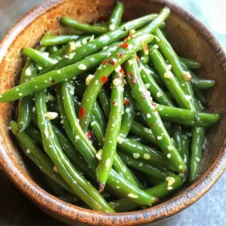 - 1 pound fresh green beans, trimmed - 4 cloves garlic, minced - 3 tablespoons olive oil Garlic roasted green beans shine with just a few simple ingredients. Fresh green beans bring a crisp, vibrant texture. The minced garlic adds a rich, savory taste. Olive oil helps to roast them evenly while enhancing their flavor. - 1 teaspoon lemon zest - 1 teaspoon balsamic vinegar - ½ teaspoon red pepper flakes You can add lemon zest for a bright, zesty note. Balsamic vinegar gives a sweet tang that pairs well with green beans. If you like a kick, sprinkle in red pepper flakes for some heat. - 2 tablespoons grated Parmesan cheese - Salt and pepper to taste For a cheesy twist, top with grated Parmesan cheese. This adds a creamy richness to the dish. Don't forget to season with salt and pepper to taste; they bring out all the flavors. Explore the Full Recipe for detailed steps and enjoy making this delicious side dish! First, you need to trim the green beans. Hold a handful and cut off the ends. This helps remove any tough parts. Next, take the garlic cloves. Use a knife to mince them finely. This will give your dish a strong garlic flavor. Now, grab a large bowl. Combine the green beans and minced garlic in it. Pour in the olive oil, lemon zest, and balsamic vinegar. If you want some heat, add red pepper flakes. Then, sprinkle with salt and pepper. Mix everything well. Make sure all the green beans are coated. Preheat your oven to 425°F (220°C). Spread the green beans in a single layer on a baking sheet. Roast them for about 15 to 20 minutes. This timing gives the beans a nice texture. Halfway through, toss them to cook evenly. When they are tender and slightly crispy, they are ready to enjoy! Spacing the green beans on the baking sheet is key. You want them in a single layer. This helps them roast evenly and get crispy. When they touch, they can steam instead of roast. Toss the green beans halfway through cooking. This ensures all sides get golden brown and tender. You can add more flavor to your green beans. Fresh herbs like thyme or rosemary work well. They give a nice aroma and taste. You might also try a sprinkle of lemon juice before serving. For extra kick, add more red pepper flakes. Just a pinch can make a big difference! Garlic roasted green beans pair well with many main dishes. They go great with chicken, fish, or steak. For a fun twist, serve them on a platter with lemon wedges. This adds color and a pop of flavor. Consider adding some toasted nuts for crunch. This makes the dish even more appealing! {{image_2}} You can cook green beans in more ways than one. Sautéing is quick and easy. Heat a pan with olive oil. Add the trimmed green beans and minced garlic. Stir until they are bright green and tender. This method gives a nice crunch. Grilling is another fun way to enjoy green beans. Toss the green beans in olive oil and seasonings. Place them on a hot grill. Grill for about 8 to 10 minutes. The beans will get a lovely smoky taste. Want to add some crunch? Toss in some nuts! Slivered almonds or chopped walnuts work great. They add a tasty texture and flavor. You can also play with cheese. Try feta, goat cheese, or a sharp cheddar. Each cheese gives a different twist. The creamy texture pairs perfectly with the green beans. If you want a vegan dish, skip the cheese. You can still have yummy flavor. Try adding a splash of soy sauce or nutritional yeast. These options keep it rich and tasty. Feel free to mix in other veggies too! Carrots or bell peppers can add color and taste. Just cut them to the same size as the green beans. This way, they all cook evenly. To store leftover garlic roasted green beans, first let them cool. Place them in an airtight container. This helps keep them fresh. You can store them in the fridge for up to three days. If you use glass containers, it helps to see the beans inside. Avoid using metal containers, as they can react with the food. To reheat your green beans, use the oven for best results. Preheat the oven to 350°F (175°C). Spread the beans on a baking sheet. Heat them for about 10 minutes. This method keeps them crispy. You can also use a microwave if you’re short on time. Heat them for 1-2 minutes, but they may become a bit soft. If you want to freeze green beans, first blanch them. Boil them for 2-3 minutes, then plunge them in ice water. This stops the cooking process and keeps their color. Dry them well before placing them in freezer bags. Remove as much air as possible. They can last in the freezer for up to six months. When ready to use, thaw them in the fridge overnight for best results. To find the best green beans, look for bright green color. They should be firm and crisp. Check for any blemishes or brown spots. Fresh green beans snap easily when bent. Choose beans that are about six inches long for the best flavor. Yes, you can prepare garlic roasted green beans ahead of time. You can trim and prep the beans a day before. Just cover them and store in the fridge. When ready, you can roast them. This keeps your cooking time short for events. Garlic roasted green beans pair well with many dishes. They go great with grilled chicken or fish. You can also serve them with pasta or rice dishes. For a fun twist, try them alongside a hearty steak. Add garlic bread for a full meal. Yes, this recipe is naturally gluten-free. All the ingredients used are safe for those with gluten issues. Just check for any added sauces or spices that may contain gluten. This way, you can enjoy this dish worry-free. For the detailed Full Recipe, you can find it [here](#). This recipe will guide you through each step. Enjoy making this tasty side dish! Garlic roasted green beans are simple yet delicious. This dish uses fresh green beans, garlic, and olive oil. You can boost the flavors with lemon zest and Parmesan. Follow the steps to prepare, mix, and roast for the best results. Remember to space the beans for even roasting. Explore different cooking methods or try new flavors for variety. Store leftovers properly for later enjoyment. This side dish pairs well with many meals. Enjoy experimenting with this recipe!