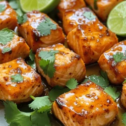 - 1 lb salmon fillet, skin removed and cut into bite-sized cubes - 1/4 cup sweet chili sauce - 1 tablespoon soy sauce The main star of this dish is the salmon. I like to choose a fresh fillet for the best taste. The sweet chili sauce adds a nice kick and sweetness. Soy sauce gives depth to the flavor. Together, they coat the salmon and make it special. - 1 tablespoon fresh lime juice - 1 teaspoon garlic powder - 1 teaspoon ginger powder Lime juice brightens up the dish with a zesty note. Garlic powder brings a savory touch, while ginger powder adds warmth. These flavors work great with salmon. They help create a tasty marinade that soaks into the fish. - 1 tablespoon sesame oil - 2 tablespoons cornstarch - Fresh cilantro for garnish Sesame oil adds a nutty flavor that enhances the bites. Cornstarch is key for a crispy finish after air frying. Fresh cilantro adds a pop of color and fresh taste when you serve. Lime wedges are great on the side for extra zing. Preparing the marinade Start by mixing the sweet chili sauce, soy sauce, lime juice, garlic powder, ginger powder, and sesame oil in a bowl. Stir until well combined. This mix gives the salmon bites a great flavor. Coating the salmon Next, add the salmon cubes to the marinade. Make sure each piece is covered well. Let the salmon marinate for at least 15 minutes. This step helps the fish soak up all the tasty flavors. Cornstarch coating process After marinating, sprinkle cornstarch over the salmon cubes. Toss gently to coat evenly. This will help the salmon bites become crispy when cooked. Preheating the air fryer Now, preheat your air fryer to 400°F (200°C). This usually takes about 3-5 minutes. Preheating ensures even cooking and a nice crispiness. Arranging salmon in the air fryer Place the salmon bites in a single layer in the air fryer basket. Avoid overcrowding, as this can affect cooking. You may need to do this in batches. Cooking time and flipping instructions Air fry the salmon for about 8-10 minutes. Flip them halfway through the cooking time. This helps achieve that perfect crispy edge. Once done, the salmon should look golden and cooked through. To get that nice crunch on your salmon bites, cornstarch is key. It helps create a crispy layer when cooked. After marinating, sprinkle the cornstarch evenly on the salmon. Toss gently to coat each piece. This step is important for a great texture. Avoid overcrowding the air fryer basket. If you pack too many salmon bites in, they won't cook evenly. Cook in batches if needed. This ensures each bite gets enough hot air for that perfect crispiness. You can adjust the spice levels to suit your taste. If you want more heat, add a bit of chili flakes or sriracha to the marinade. Taste it before adding the salmon to make sure it’s just right. For marinating, aim for at least 15 minutes. This lets the flavors soak into the fish. If you have more time, let it marinate for up to an hour. The longer it sits, the more flavorful your salmon bites will be. These salmon bites pair well with simple side dishes. Try serving them with steamed rice or a fresh salad. Both will balance the richness of the salmon. For presentation, place the salmon bites on a nice platter. Garnish with fresh cilantro and lime wedges. This adds color and a fresh burst of flavor that everyone will love. {{image_2}} You can change the flavor of your salmon bites easily. Try using a teriyaki marinade instead of sweet chili sauce. This will give you a sweet and savory taste. If you want some heat, add sriracha sauce. Just mix it with your marinade to get a spicy kick. Both options keep the dish fun and fresh. Not a fan of salmon? You can switch to chicken bites. Use the same marinade and cooking steps. The result is just as tasty. Shrimp is another great choice. It cooks fast and pairs well with the sweet chili flavor. Plus, shrimp adds a nice seafood twist to your meal. You can also air fry vegetables with your salmon. Just toss in some bell peppers or zucchini. Cook them alongside the salmon for a healthy side. This method creates a colorful dish. You can even make a full vegetable medley. Mix your favorite veggies for more flavor and texture. This way, you get a balanced meal that is both tasty and healthy. To keep your leftover salmon bites fresh, store them in the fridge. Place them in an airtight container. This will help keep them from drying out. You can also use a glass or plastic container with a tight lid. Make sure to eat them within three days for the best taste. You can easily reheat your salmon bites in the air fryer. Preheat the air fryer to 350°F (175°C). Place the salmon bites in a single layer in the basket. Heat for about 3-5 minutes. This keeps them crispy and tasty. If you prefer the oven, preheat it to 350°F (175°C). Spread the salmon bites on a baking sheet. Bake for about 10 minutes, or until warm. This method works well, but they might not be as crispy. To freeze salmon bites, let them cool completely first. Then, place them in a single layer on a baking tray. Freeze them for about an hour. This helps keep them from sticking together. After that, transfer the bites to a freezer bag or container. Label it with the date. They can last in the freezer for up to three months. When you're ready to eat, take them out and thaw in the fridge overnight. You can also reheat them directly from the freezer in the air fryer. Just add a few extra minutes to the cooking time. You have a few tasty options if you need a substitute for sweet chili sauce. Here are some alternatives: - Teriyaki sauce: This sauce adds a sweet and savory flavor. - Sriracha: For a spicy kick, mix Sriracha with honey for sweetness. - Honey mustard: This gives a sweet and tangy taste that works well. - Hoison sauce: Great for a deeper flavor with some sweetness. Each of these options can change the taste a bit but still make your salmon bites delicious. Marinating the salmon is key for great flavor. You should marinate it for at least 15 minutes. This time lets the salmon soak up the sauce. You can marinate it for up to 1 hour. Just don't go longer than that, or the fish can become too soft. Yes, you can bake these salmon bites if you prefer. Here’s how to do it: 1. Preheat your oven to 400°F (200°C). 2. Place the marinated salmon bites on a baking sheet lined with parchment paper. 3. Bake them for about 12-15 minutes. Flip them halfway through to ensure even cooking. Baking will give you a different texture, but they will still taste great! This article covered the key steps to make air fryer sweet chili salmon bites. We explored the main ingredients like salmon, sweet chili sauce, and soy sauce. I provided tips on marinating and achieving crispy bites. You can also vary the recipe with different sauces and proteins. In conclusion, making these bites is easy and fun. Enjoy experimenting with flavors and serving ideas. Happy cooking!