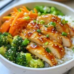 - 2 boneless, skinless chicken breasts - 1 cup cooked jasmine rice - 1/2 cup honey - 2 tablespoons sriracha sauce - 1 tablespoon soy sauce - 1 teaspoon garlic powder - 1 teaspoon smoked paprika - Salt and pepper to taste The main ingredients create a strong base for this dish. The chicken breasts give a good source of protein. Honey adds sweetness, while sriracha brings the heat. Soy sauce adds umami, making every bite rich. Garlic powder and smoked paprika enhance the overall flavor. - 1 cup broccoli florets - 1 carrot, julienned - 1/4 cup green onions, sliced Fresh vegetables add color and nutrients. Broccoli florets bring a nice crunch. Julienned carrots add sweetness and texture. Green onions make a bright garnish, which looks good on the plate. - Sesame seeds - Additional sauces or toppings Optional garnishes let you make this bowl your own. Sesame seeds add a nice crunch and nutty flavor. You can also drizzle more sauce for an extra kick. Feel free to get creative with toppings! {{ingredient_image_1}} To make the marinade, mix honey, sriracha, soy sauce, garlic powder, smoked paprika, salt, and pepper in a bowl. Whisk until it blends well. Next, add the chicken breasts. Make sure they are fully coated in the marinade. For the best flavor, marinate for at least 30 minutes. If you have time, let it sit in the fridge for up to 2 hours. For cooking, use a skillet. Heat a tablespoon of oil over medium heat. Add the marinated chicken breasts. Cook them for about 6-7 minutes on each side. Check for doneness by cutting into the thickest part. The juices should run clear. Once done, let the chicken rest for a few minutes. Then slice it into strips. To prepare the broccoli, steam the florets until they are bright green and tender. This should take about 4-5 minutes. Set the broccoli aside. Next, in the same skillet, add the julienned carrot. Sauté the carrot for about 2 minutes. The goal is to soften it slightly while keeping some crunch. Start by layering the ingredients in a bowl. First, add a scoop of jasmine rice at the bottom. Next, place the sliced hot honey chicken on top. Follow with the steamed broccoli and sautéed carrots. For extra flavor, drizzle any leftover honey-sriracha marinade over everything. Finally, garnish with sliced green onions and a sprinkle of sesame seeds. Enjoy your meal! To make your chicken full of flavor, marinate it well. Mix honey, sriracha, soy sauce, garlic powder, smoked paprika, salt, and pepper. Let the chicken soak in this mix. For the best results, marinate for at least 30 minutes. If you have time, go for 2 hours in the fridge. You can also cook the chicken in different ways. Try grilling it for a smoky taste or baking it for a healthier option. Each method brings out unique flavors. You can change the sauce to fit your taste. Add lime juice for a zesty kick. Try using maple syrup instead of honey for a different sweetness. If you like it spicy, mix in more sriracha or even some chili flakes. Adjusting the spice level is easy. If you want it hotter, add a bit more sriracha. If you prefer milder, reduce the amount. Make your bowl pop with colors. Start with fluffy jasmine rice, then add sliced chicken on top. Arrange the bright green broccoli and orange carrots around it. For an extra touch, drizzle leftover marinade over the top. Finish with green onions and sesame seeds to add texture. This makes the meal look as good as it tastes. Pro Tips Marinate Longer for Flavor: For a deeper flavor, marinate the chicken for up to 2 hours in the refrigerator. This allows the spices to penetrate the meat more thoroughly. Use Fresh Ingredients: Fresh broccoli and carrots not only enhance the flavor but also add vibrant color and nutrients to your bowl. Adjust Heat Level: Customize the spiciness by adjusting the amount of sriracha in the marinade. For milder heat, reduce the sriracha, or for extra kick, add more. Serve with a Side: Pair this bowl with a side of crispy wontons or spring rolls for a complete meal experience. {{image_2}} You can swap jasmine rice for brown rice or cauliflower rice. Brown rice adds more fiber and nutrients. Cauliflower rice cuts carbs and is low in calories. For the sauce, use less honey or a sugar substitute. You can also mix in some low-sodium soy sauce. These changes keep the taste while making it better for you. If you want a meatless option, use tofu or tempeh instead of chicken. They soak up flavors well. For tofu, press it first to remove water, then marinate it. You can also add extra spices like cumin or coriander to boost flavor. These plant-based proteins make a tasty bowl too. This dish is versatile. You can turn it into a wrap or salad. Use a whole wheat wrap and fill it with the same ingredients. For a salad, mix greens with the rice, chicken, and veggies. Think about adding toppings like avocado, nuts, or cheese for more crunch and flavor. To keep your hot honey chicken bowl fresh, start by placing it in an airtight container. This helps keep out air and moisture. You can store the bowl in the fridge for up to four days. If you want to enjoy it later, make sure to cool it down before sealing it. If you want to freeze your hot honey chicken bowl, separate the components first. Freeze the chicken, rice, and veggies in individual bags. You can store them in the freezer for up to three months. When you're ready to eat, thaw the chicken and veggies overnight in the fridge. Reheat everything on the stove or in the microwave until hot. Meal prepping can make busy days easier. Cook a batch of chicken and rice at the start of the week. Store the marinated chicken separately to keep it fresh. You can also pre-cook the broccoli and carrots. Just heat them up when you're ready to eat. This way, you have a quick meal ready in no time! To make the chicken spicier, add more sriracha or your favorite hot sauce. You can start with one extra tablespoon of sriracha for a nice kick. If you love heat, try using different hot sauces like chipotle or cayenne. Adjust the heat to your taste. Yes, you can use other types of rice! Brown rice is a great option if you want more fiber. Jasmine rice works well for its fluffy texture and flavor. Quinoa is another healthy choice that adds protein. Choose whatever rice you like best. This dish is great for meal prep! You can marinate the chicken ahead of time and store it in the fridge. Cooked chicken stays fresh for about four days. Keep rice and veggies in separate containers. This way, you can reheat them later without losing flavor. If you need a honey substitute, try agave syrup or maple syrup. Both offer a sweet flavor similar to honey. Agave is a bit thinner, while maple syrup has a unique taste. Use them in the same amount as honey for the best results. In this post, we covered how to make a Hot Honey Chicken Bowl. You learned about the main ingredients, like chicken, rice, and honey. I shared step-by-step instructions for marinating and cooking the chicken, plus tips for veggies. You can customize the dish, making it healthier or vegetarian. Don’t forget about storage tips for leftovers and meal prep. This bowl is not only tasty but also easy to adapt. Get creative and enjoy your cooking!