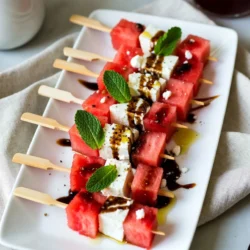 To make Watermelon Feta Skewers, you need fresh and simple ingredients. Here&rsquo;s what you will use: - 4 cups watermelon, cubed - 1 cup feta cheese, crumbled - 1/2 cup fresh mint leaves - 1 tablespoon balsamic glaze - 1 tablespoon olive oil - Salt and pepper to taste - Skewers (wooden or metal) These ingredients combine to create a dish that is light and bright. The watermelon gives a sweet taste, while the feta adds a creamy saltiness. Fresh mint leaves bring in a refreshing note. The balsamic glaze provides a touch of tang. Olive oil ties all the flavors together. Make sure to choose ripe watermelon for a juicy bite. Crumbled feta should be creamy and fresh. Fresh mint leaves should be bright green and fragrant. This mix creates a fun flavor party on a stick. Perfect for summer gatherings, these skewers are quick to prepare and easy to share. {{ingredient_image_1}} Preparing the Watermelon and Feta Start by cutting the watermelon. Cube it into bite-sized pieces. This helps with easy eating. Next, if your feta is not crumbled, crumble it now. You want small, soft bits. These blend well with the watermelon. Soaking Wooden Skewers If you choose wooden skewers, soak them in water for about 30 minutes. This keeps them from burning. Wet skewers also help food slide on and off easily. Assembling the Skewers Now it&rsquo;s time to assemble! Grab a skewer and thread a piece of watermelon first. Then add a fresh mint leaf. Finally, add a piece of feta cheese. Repeat this process. Alternate between watermelon, mint, and feta. Aim for about three to four sets per skewer. This creates nice layers of flavor. Make the Dressing In a small bowl, mix the balsamic glaze and olive oil. Whisk them together until smooth. Add a pinch of salt and pepper to taste. This dressing adds a rich flavor to your skewers. Final Arrangement and Serving Once your skewers are ready, place them on a large platter. Drizzle the balsamic dressing over them. For a pretty touch, scatter extra mint leaves around the skewers. You can even add a little more balsamic glaze on top for flair. Enjoy your fresh summer treat! Cutting watermelon can be tricky. Start with a sharp knife for clean cuts. Cut the melon in half, then slice it into wedges. Remove the rind from each wedge. Finally, cube the flesh into bite-sized pieces. This makes them easy to skewer. Feta cheese adds a salty kick. Choose high-quality feta for the best taste. Look for creamy, crumbly varieties. Avoid overly dry feta, as it won't blend well with the juicy watermelon. If you use wooden skewers, soak them in water for 30 minutes. This step keeps them from burning on the grill. Simply place the skewers in a bowl of water. It&rsquo;s a quick and easy way to prepare them. When threading the skewer, start with watermelon, then mint, then feta. Repeat this pattern for a balanced flavor. Aim for about three to four pieces of each on one skewer. This keeps each bite exciting and flavorful. Pro Tips Choose the Right Watermelon: Look for a watermelon that is symmetrical and has a uniform shape. A yellow spot on one side indicates ripeness and sweetness. Fresh Mint Matters: Use fresh mint leaves for the best flavor. If you can find spearmint, it pairs particularly well with watermelon. Customize Your Skewers: Feel free to add other ingredients like cucumber or basil for a unique twist. These can complement the flavors beautifully. Serve Chilled: For an extra refreshing experience, chill the skewers in the refrigerator for about 30 minutes before serving. {{image_2}} You can play with flavors in your Watermelon Feta Skewers. Adding other ingredients can change the taste. For instance, try adding cucumber slices. They add crunch and freshness. You can also use prosciutto for a savory touch. The saltiness pairs well with sweet watermelon. Next, think about dressings. Instead of balsamic glaze, try honey or a yogurt sauce. Honey adds sweetness, while yogurt gives creaminess. Both are tasty alternatives that change the dish. If you want to switch the cheese, there are great options. Goat cheese works well. It has a tangy taste that complements watermelon. Another good choice is mozzarella. Its mild flavor blends nicely with the other ingredients. Experimenting with these variations makes your skewers unique. You can find new favorites with just a few changes. Ideal Storage Conditions Store leftover skewers in an airtight container. Use a container that is not too big. This will keep the skewers from spilling. Place parchment paper between layers for extra care. Shelf Life Tips These skewers stay fresh for about 2 days in the fridge. The watermelon may lose its crunch after that. If you want to keep them longer, avoid adding dressing until you serve them. Reheating or Serving Cold I recommend serving these skewers cold. They taste best when fresh. If you like, you can drizzle more balsamic glaze on top before serving. This adds flavor and makes them look great! To make Watermelon Feta Skewers, gather your ingredients first. You&rsquo;ll need watermelon, feta cheese, fresh mint, balsamic glaze, olive oil, salt, and pepper. Start by cubing the watermelon and crumbling the feta cheese. Then, soak wooden skewers for about 30 minutes. Thread watermelon, mint, and feta onto the skewers in that order. For the dressing, mix balsamic glaze and olive oil, adding salt and pepper to taste. Drizzle this over the skewers before serving. Serve these skewers on a long platter. Adding extra mint leaves around them makes a nice touch. You can also drizzle more balsamic glaze on top for extra flavor. These skewers work well as a refreshing appetizer or a light snack on warm days. They pair nicely with grilled meats or seafood, making them great for summer cookouts. Yes, you can prepare these skewers in advance. Make them a few hours before your event and keep them in the fridge. Just be sure to store them in an airtight container. This helps keep the flavors fresh and the watermelon crisp. I suggest drizzling the balsamic glaze just before serving to maintain the best taste and texture. Absolutely! Watermelon is hydrating and low in calories. It is high in vitamins A and C. Feta cheese adds protein and calcium, making these skewers a tasty and healthy choice. Mint also offers digestive benefits and adds fresh flavor. This dish is a great way to enjoy nutritious ingredients while keeping things fun and light. If you want a different cheese, try goat cheese or ricotta. Both add a creamy texture and unique flavor. For a vegan option, use a plant-based feta made from nuts or tofu. You can also skip the cheese entirely for a lighter version. The watermelon and mint still shine bright on their own! This blog post showed you how to make tasty watermelon feta skewers. We covered the right ingredients, step-by-step instructions, and best practices. I shared tips on storing leftovers and fun variations to keep it fresh. These skewers are easy to prepare and perfect for any gathering. Enjoy the fresh flavors and impress your guests! You now have all the tools you need to create this delightful dish. Happy skewering!