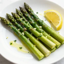 Asparagus is a green veggie that is both tasty and healthy. For this recipe, choose 1 pound of fresh asparagus. Look for bright green spears. They should feel firm and have tightly closed tips. Trim the bottoms to about 2 inches. This removes the tough ends for a better bite. This dish shines with just a few key flavors. You need: - 3 tablespoons olive oil - 3 cloves garlic, minced - Zest of 1 lemon - Juice of 1 lemon - Salt and pepper to taste The olive oil adds richness. Garlic gives it a nice kick. Lemon zest and juice brighten the dish. Salt and pepper enhance all the flavors. For a little extra flair, add these options: - 1 teaspoon red pepper flakes (for some heat) - 2 tablespoons grated Parmesan cheese (for creaminess) - Fresh parsley, chopped (for a fresh finish) These add-ins can change the dish's taste. Adjust them to fit your mood or meal. Enjoy making your lemon garlic asparagus special! {{ingredient_image_1}} First, set your oven to 400&deg;F (200&deg;C). This high heat helps the asparagus roast well. A hot oven makes the asparagus tender and gives it a nice crisp. In a big bowl, add the trimmed asparagus. Pour in 3 tablespoons of olive oil. Add 3 minced garlic cloves, the zest of one lemon, and the juice of that lemon too. If you want a kick, toss in 1 teaspoon of red pepper flakes. Mix it all up well. Make sure the asparagus gets covered evenly. Now, season with salt and pepper to your taste. Give it another gentle toss to ensure everything is mixed well. This mixture is what makes the asparagus shine! Spread the asparagus mixture across a baking sheet. Make sure it&rsquo;s in a single layer. This step helps it roast evenly. Place the baking sheet in your preheated oven. Roast for about 12 to 15 minutes. Check it until the asparagus is tender and slightly crispy. Once it's done, take it out of the oven. If you like cheese, sprinkle 2 tablespoons of grated Parmesan while it&rsquo;s still hot. This adds a rich flavor. Finally, sprinkle some chopped fresh parsley for a bright touch before serving. Enjoy your delicious lemon garlic asparagus! To get the best tender asparagus, start with fresh stalks. Look for bright green color and firm texture. Trim the ends about one inch to remove the tough part. This helps them cook evenly. Roasting at 400&deg;F (200&deg;C) creates a great balance of crispiness and tenderness. Keep an eye on them. They should be done in 12-15 minutes. You want them to be soft but not mushy. Lemon and garlic bring out the best in asparagus. Mince the garlic finely for a strong taste. The zest adds a bright flavor without bitterness. Feel free to add red pepper flakes for a bit of heat. Just a teaspoon is enough to wake up the dish. A sprinkle of salt and pepper at the end helps balance the flavors too. If you want a cheesy touch, add Parmesan while hot. It melts into the asparagus beautifully. Serving is key to making a dish shine. Use a pretty platter for the asparagus. Drizzle any leftover garlic-lemon oil from the pan on top. This adds flavor and looks nice. A lemon wedge on the side gives a fresh pop of color. For a finishing touch, sprinkle chopped parsley over the top. This not only looks great but also adds fresh flavor. Pro Tips Choose Fresh Asparagus: Select bright green asparagus with firm stalks and closed tips for the best flavor and texture. Adjust Roasting Time: Thinner asparagus spears will cook faster, so keep an eye on them to avoid overcooking. Experiment with Seasonings: Feel free to customize the garlic and lemon with herbs like thyme or rosemary for a different flavor profile. Serve Immediately: Asparagus is best enjoyed fresh out of the oven while it's still warm and crisp. {{image_2}} You can add Parmesan cheese to your lemon garlic asparagus for extra flavor. When the asparagus is hot from the oven, sprinkle grated Parmesan on top. The heat will melt the cheese slightly, creating a creamy texture. This adds a rich taste that pairs well with the bright lemon and garlic. If you enjoy heat, add red pepper flakes to the mix. This will give your asparagus a spicy kick. Start with a teaspoon of red pepper flakes, and adjust to your liking. The spice balances the acidity of the lemon and the warmth of the garlic. Lemon garlic asparagus pairs well with many dishes. Serve it alongside grilled chicken or fish for a balanced meal. You can also enjoy it with quinoa or brown rice for a vegetarian option. For a simple lunch, toss it in a salad with greens and chickpeas. This dish is versatile and complements various flavors. To keep your lemon garlic asparagus fresh, store it in an airtight container. This keeps moisture in and prevents the asparagus from drying out. If you have leftover garlic-lemon oil, save that too. It adds great flavor when you reheat the dish. Reheat your asparagus in the oven or on the stovetop. For the oven, set it to 350&deg;F (175&deg;C). Place the asparagus on a baking sheet and warm for about 10 minutes. On the stovetop, heat a skillet over medium heat. Add a splash of olive oil and saut&eacute; for 3-5 minutes until warmed through. Lemon garlic asparagus stays good for up to 3 days in the fridge. After that, it may lose its crispness and flavor. Always check for any signs of spoilage before eating leftovers. Yes, you can use frozen asparagus. However, fresh asparagus gives the best taste and crunch. If you use frozen, thaw it first. Pat it dry to remove extra water. This helps get a nice roast. To trim asparagus, hold the stalk in your hands. Bend it gently until it snaps. It will break where the tough part ends. You can also cut off about an inch from the bottom with a knife. This keeps your asparagus tender. Asparagus is done when it is bright green and tender. You can test it with a fork. If it goes in easily, it is ready. The tips should be slightly crispy, not mushy. This means you&rsquo;ve cooked it just right. This article covered everything you need to know about cooking asparagus. We explored fresh asparagus details and essential seasonings. I shared step-by-step instructions and useful tips for perfecting your dish. You also learned fun variations and the best ways to store your leftovers. Remember, asparagus is flexible, so feel free to experiment. Whether you roast it or try a new flavor, enjoy each bite. Happy cooking!